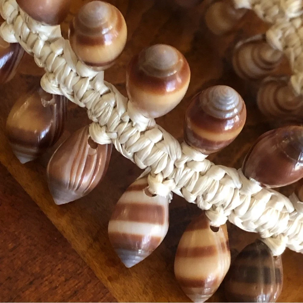 Handcrafted boho resin coated shell braided bracelet